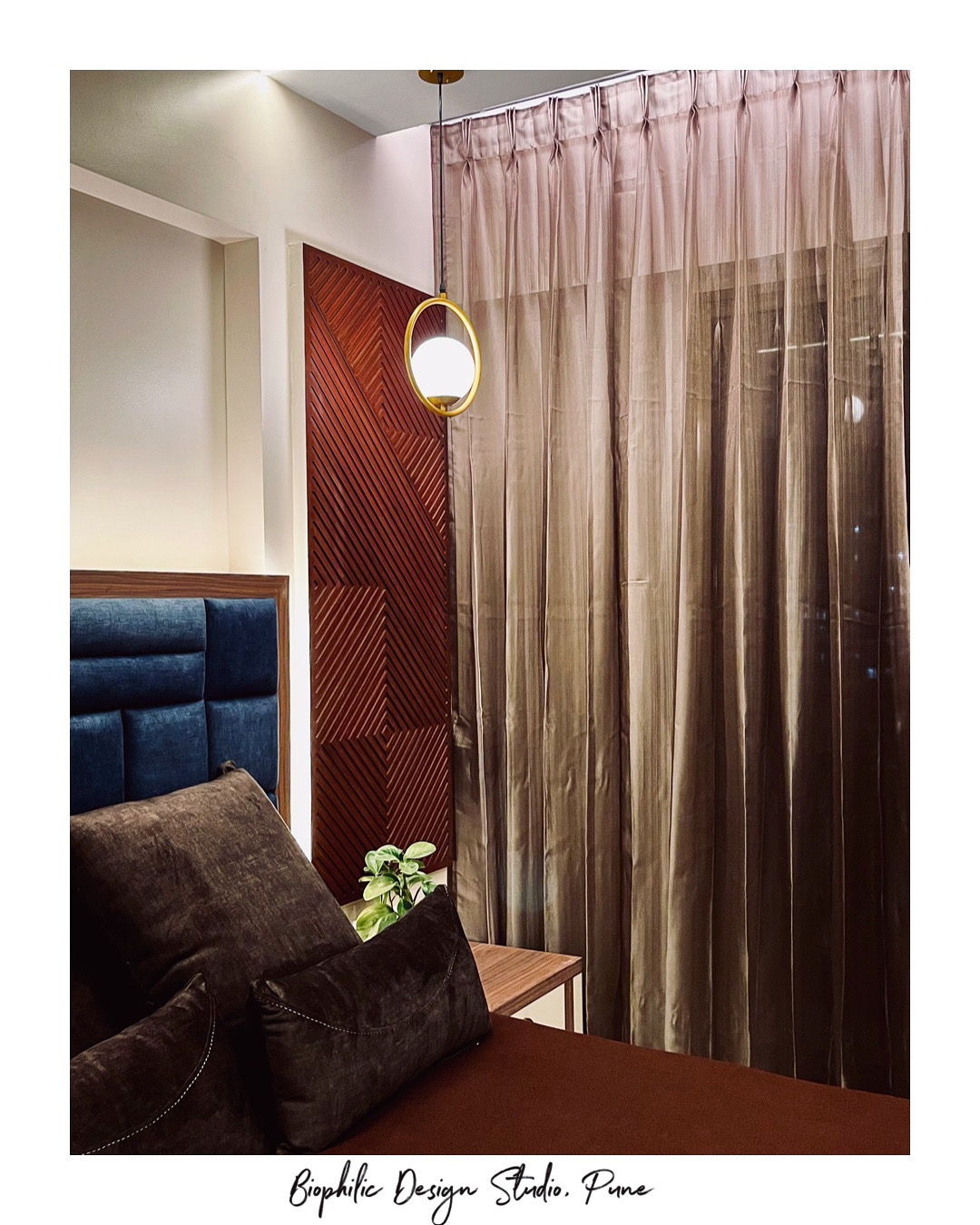 Bedroom with wooden headboard and sheer curtains
